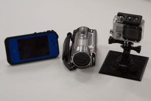 You have choices for video and photos, from the left, an iPhone, small video camera or the most popular device, a GoPro.