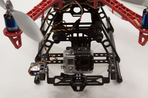 Great choice for video production is this camera mount that has rubber grommets separating the mounting platform from the actual quadcopter frame. There is also a separate control for the X and Y axes of the camera for stabilization.