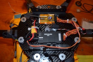 The Zenmuse controller and OrangeRX 9ch receiver are attached to the bottom of the 200mm Vibration Isolation System.